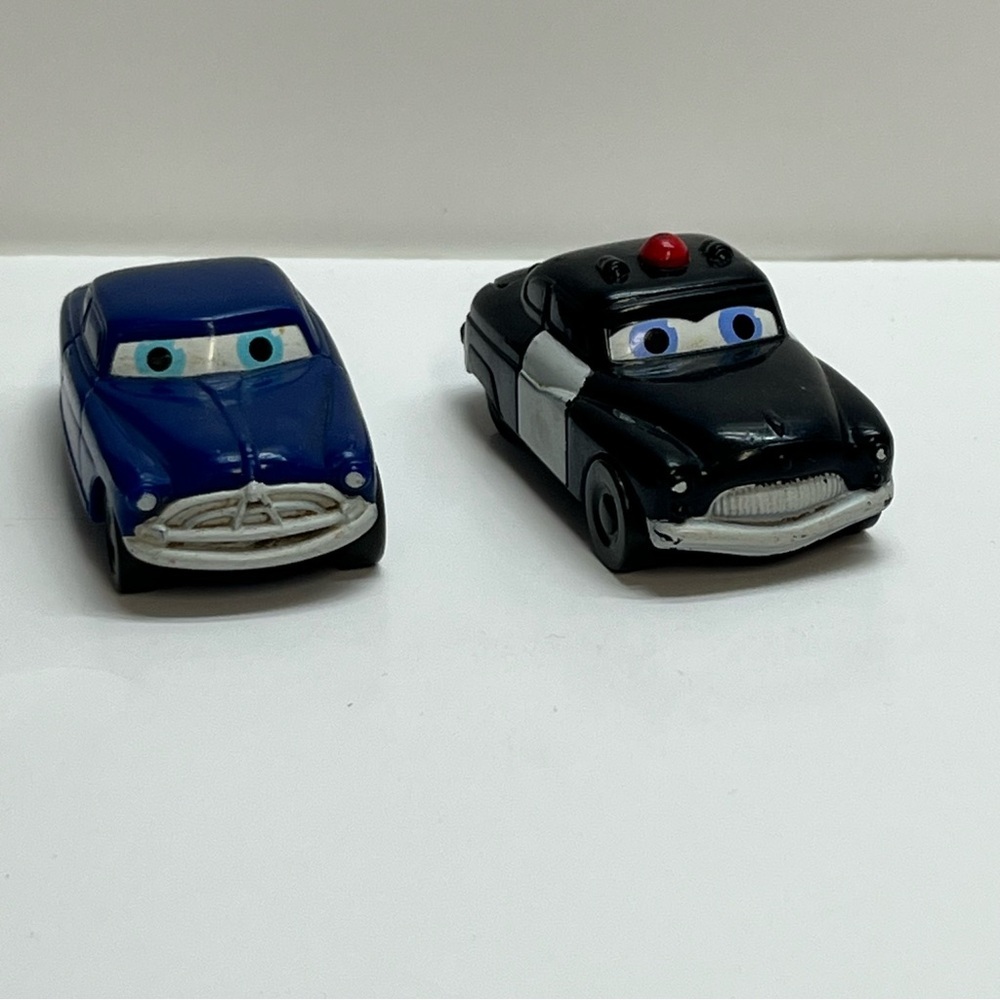 disney pixar cars doc hudson and sheriff‎ kellogg promo 2006